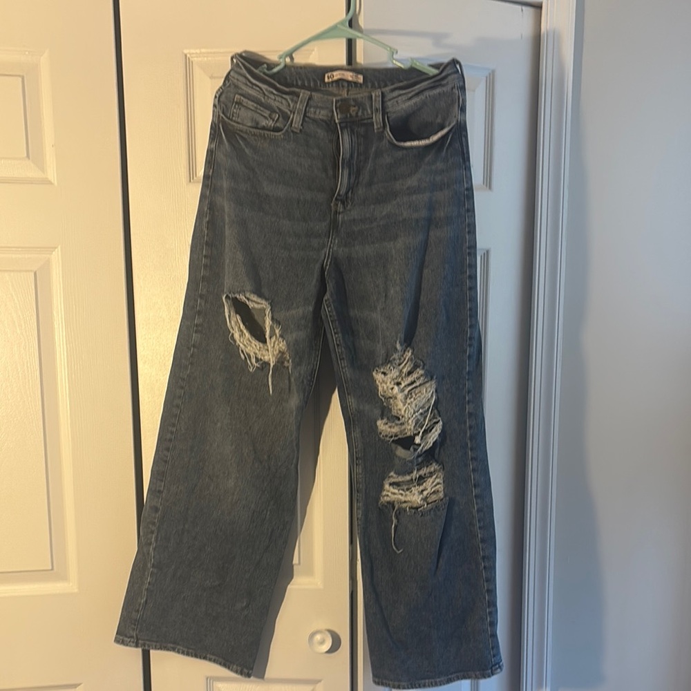 Distressed Blue Jeans